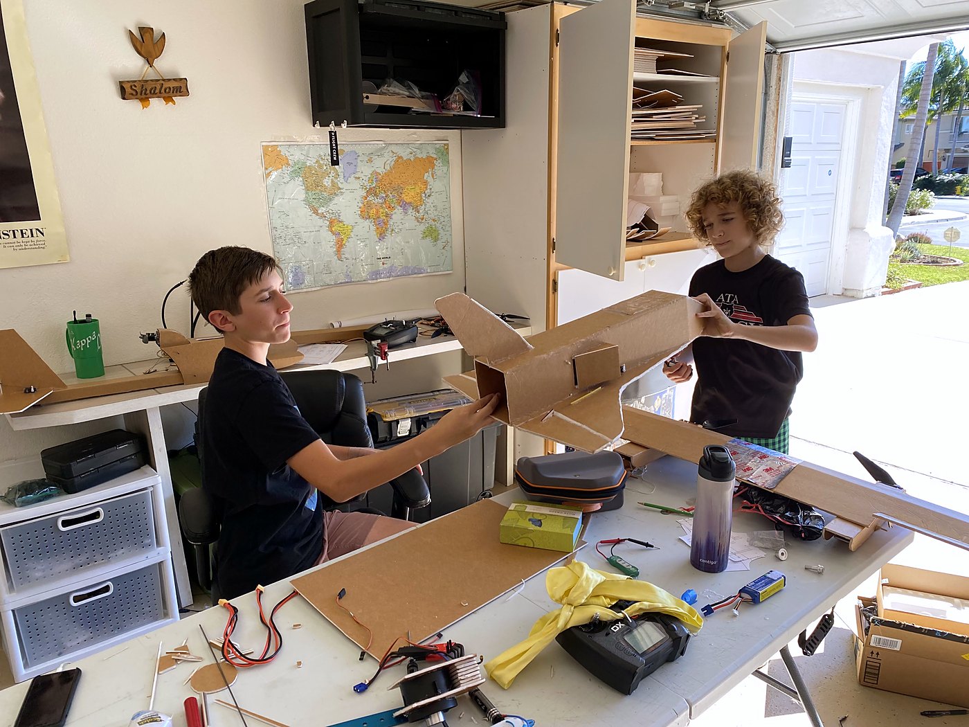 Building the space shuttle plane with a friend in the garage