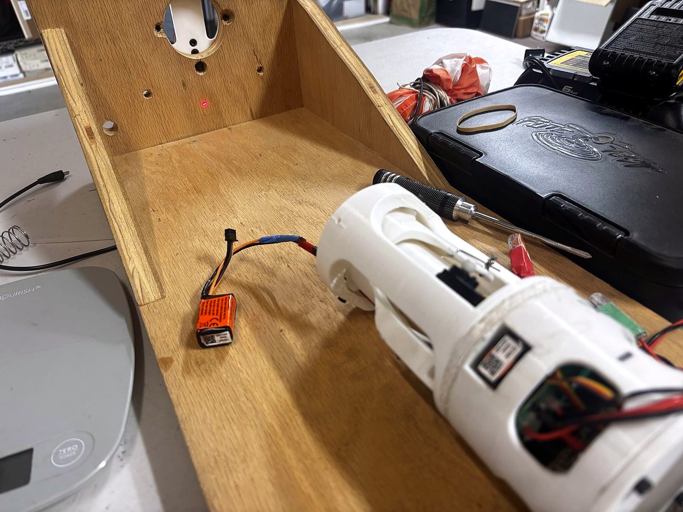 A laser marking the centre line of the airframe while the thrust vector mount is aligned